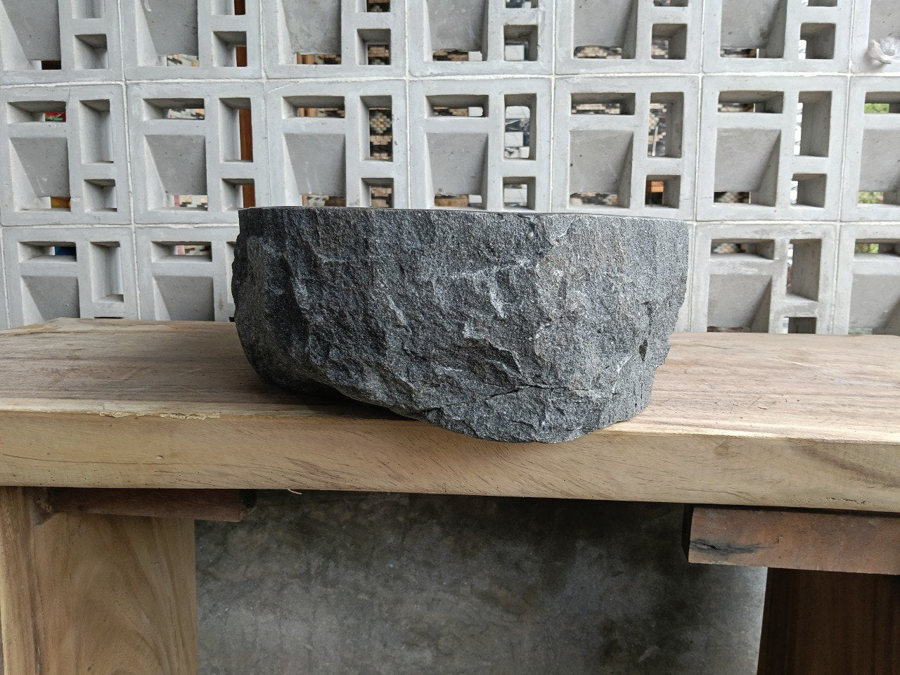Right side perspective of handcrafted dark gray andesite sink
