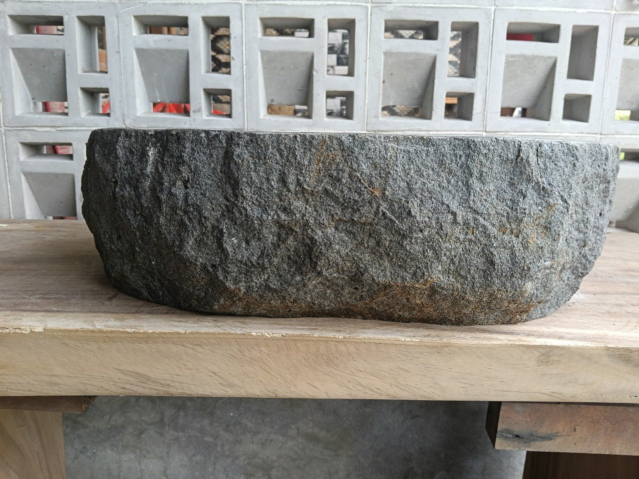 Right side perspective of handcrafted light gray andesite stone sink
