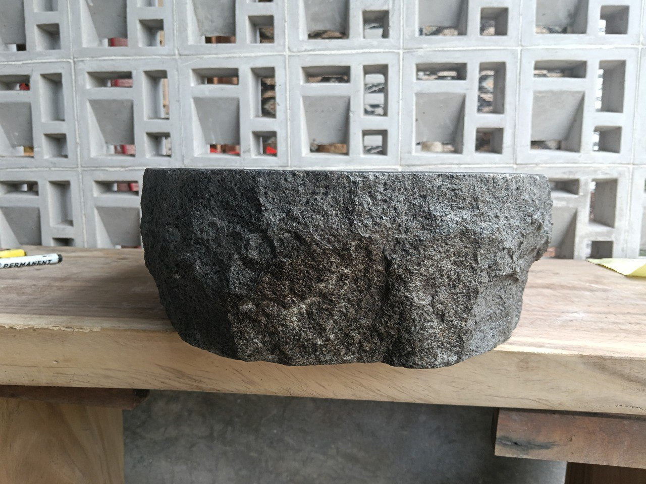 Right side perspective of handcrafted dark gray andesite stone sink
