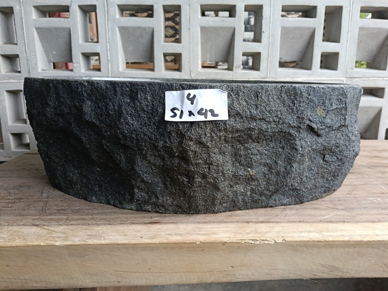 Front view of handcrafted oval andesite bathroom sink
