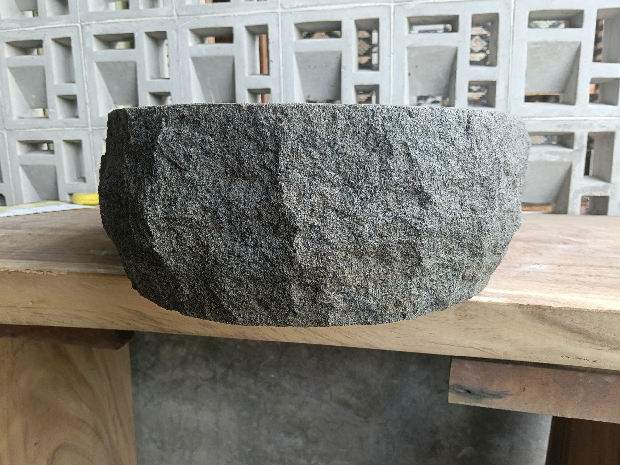 Right side perspective of handcrafted dark gray andesite stone sink
