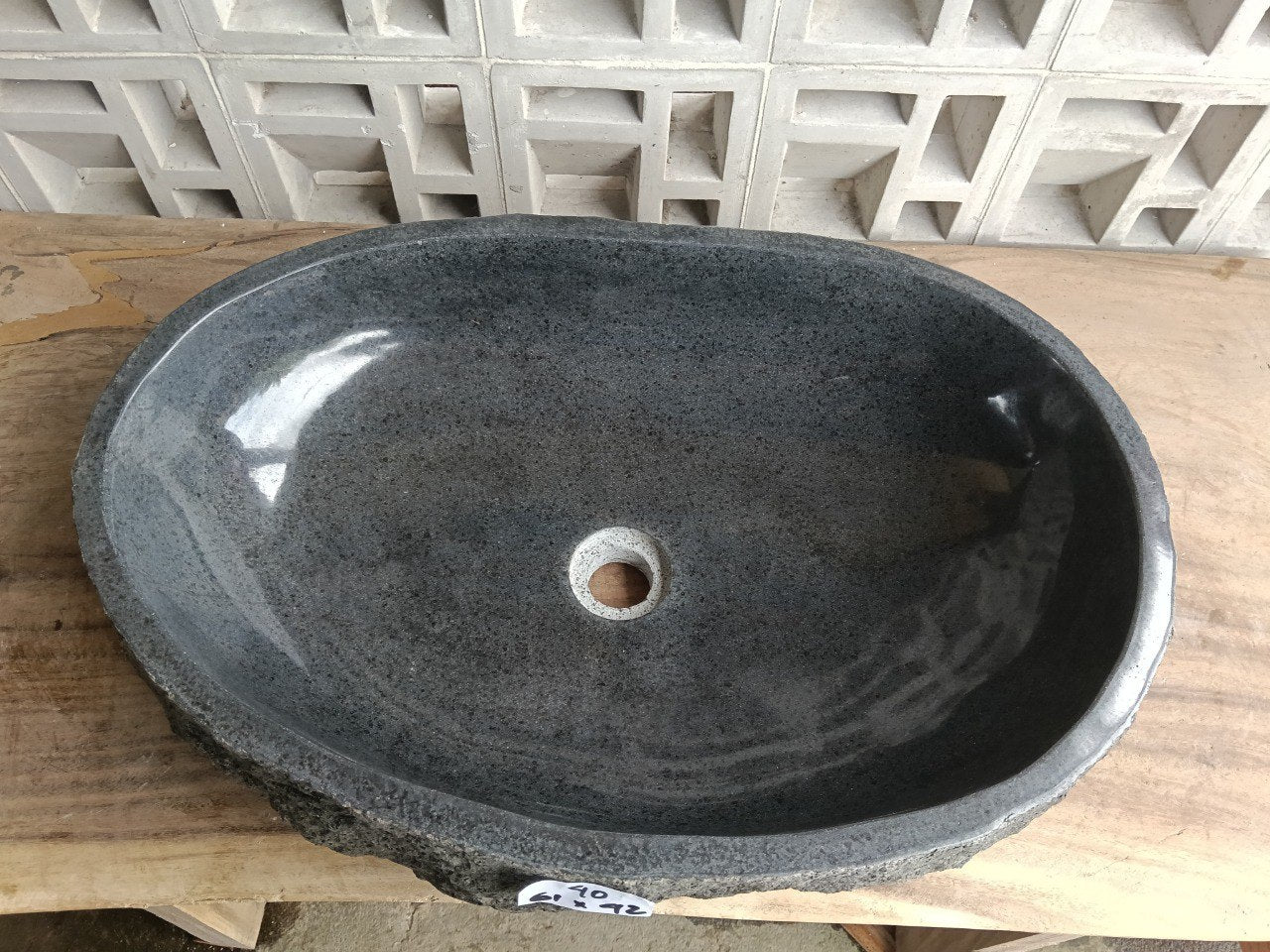 Top view of elongated oval dark gray andesite stone sink ndz6040-6142
