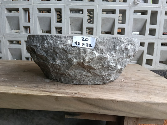 Front view of handcrafted gray marble bathroom sink
