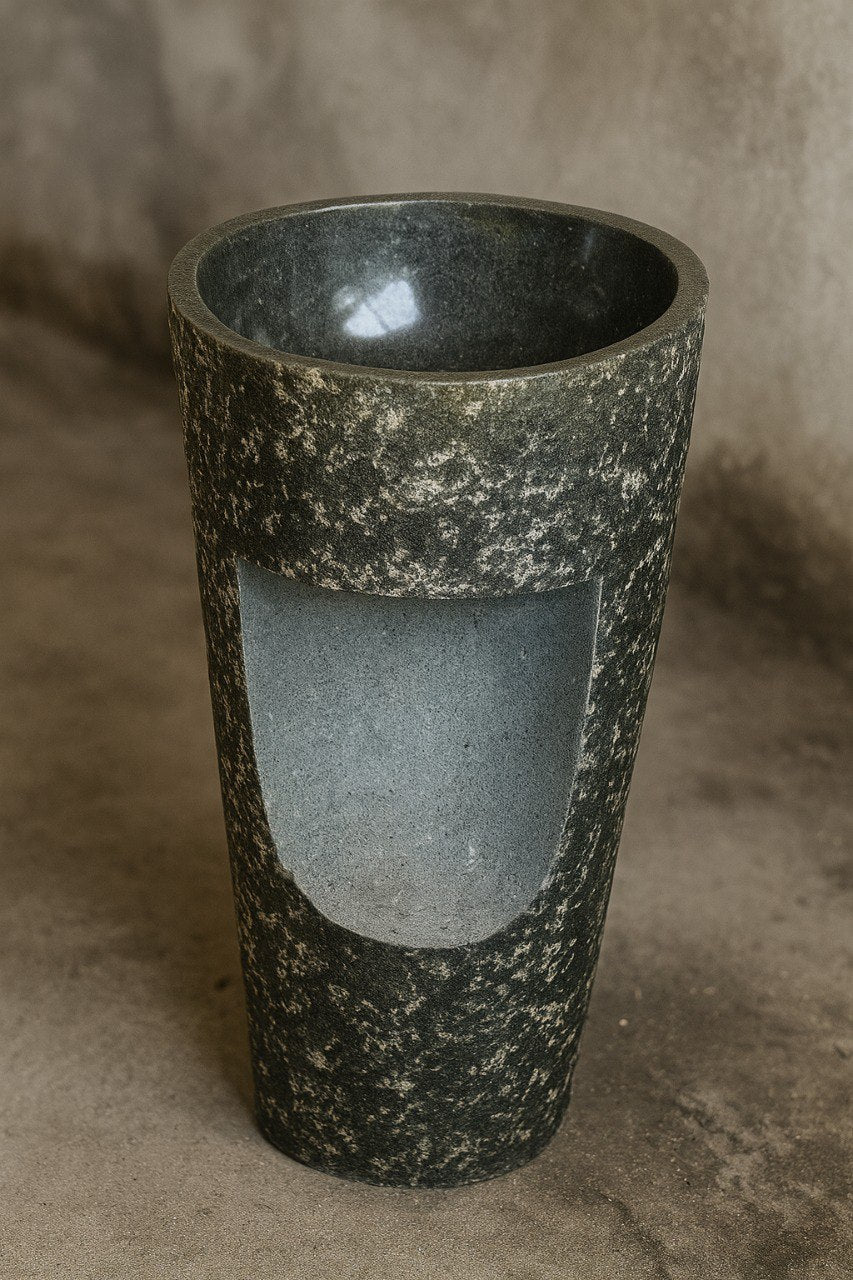 Side angle of natural stone andesite pedestal sink
