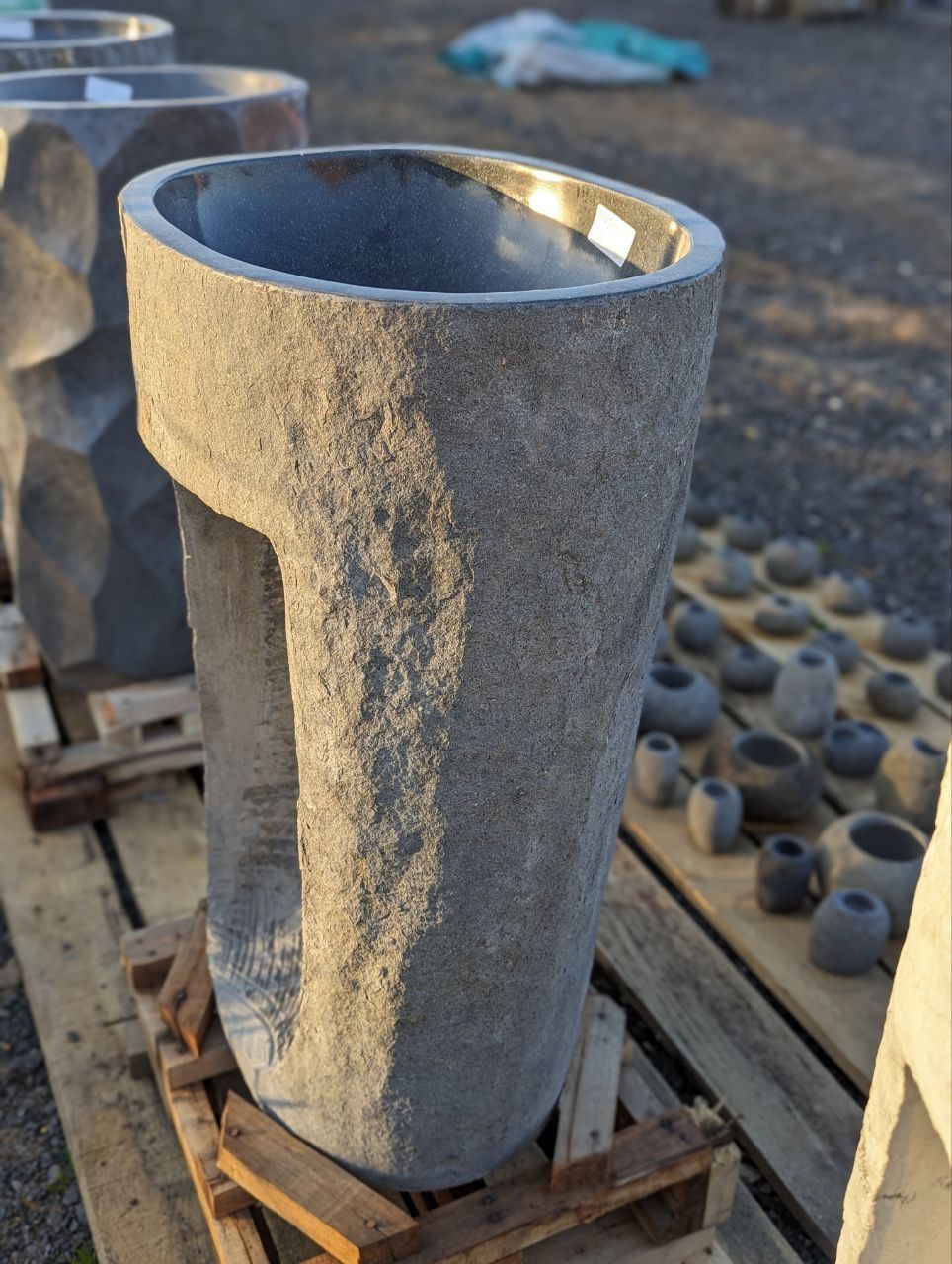 Full height view of 35 inch river stone pedestal sink
