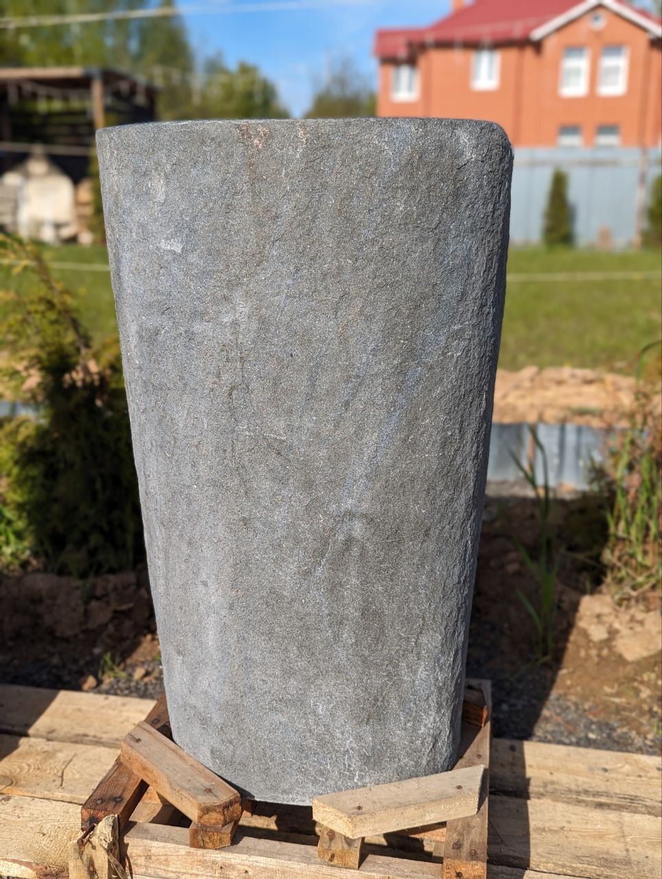Luxury bathroom freestanding pedestal sink made from river stone
