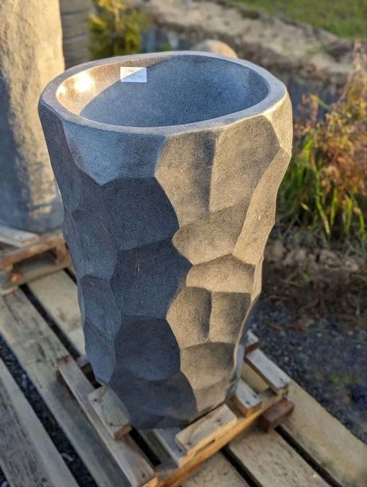 Luxury bathroom pedestal sink crafted from natural river stone
