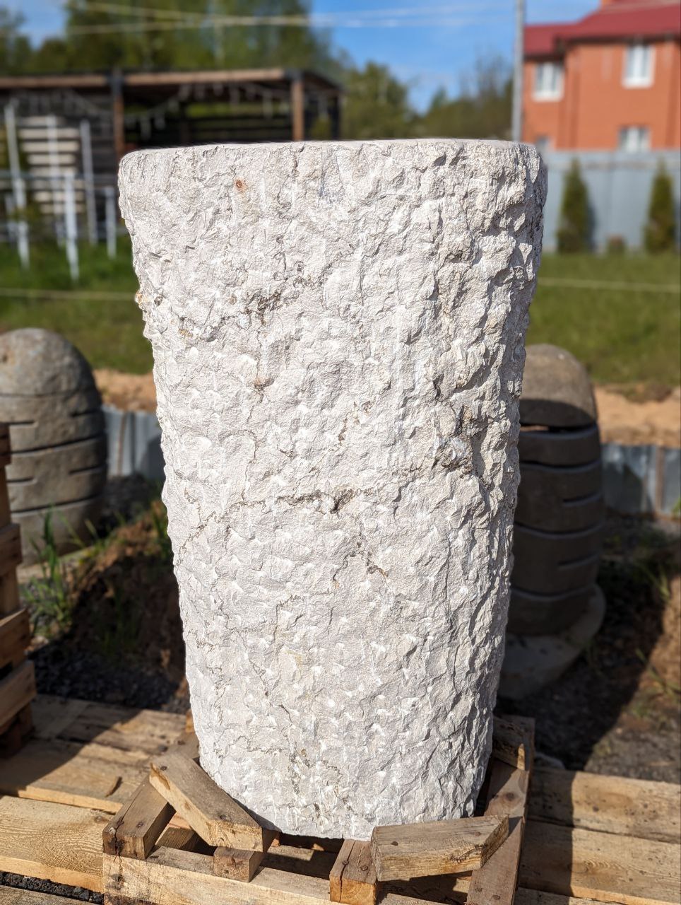 Luxury freestanding pedestal sink in white marble for bathrooms
