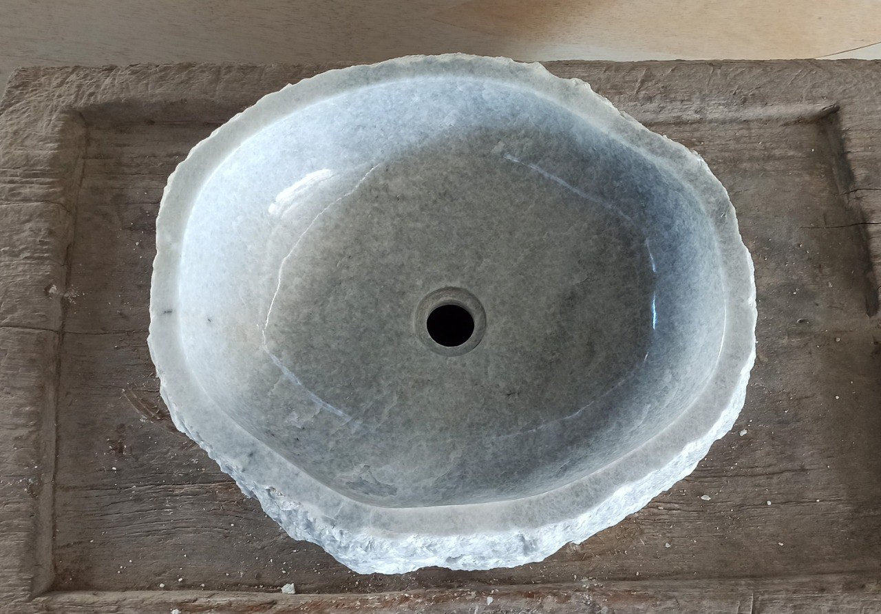 Top view of 5085-494316 gray onyx sink with polished interior and rough natural exterior, organic irregular shape.
