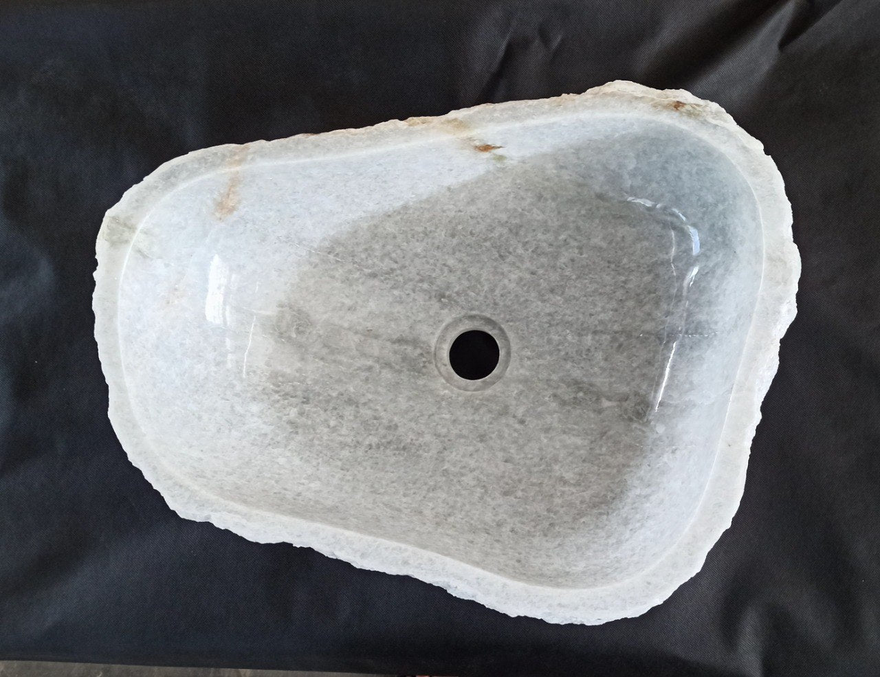 Top view of 5126-523915 light gray–beige onyx sink with polished interior and rough natural exterior, organic irregular shape.
