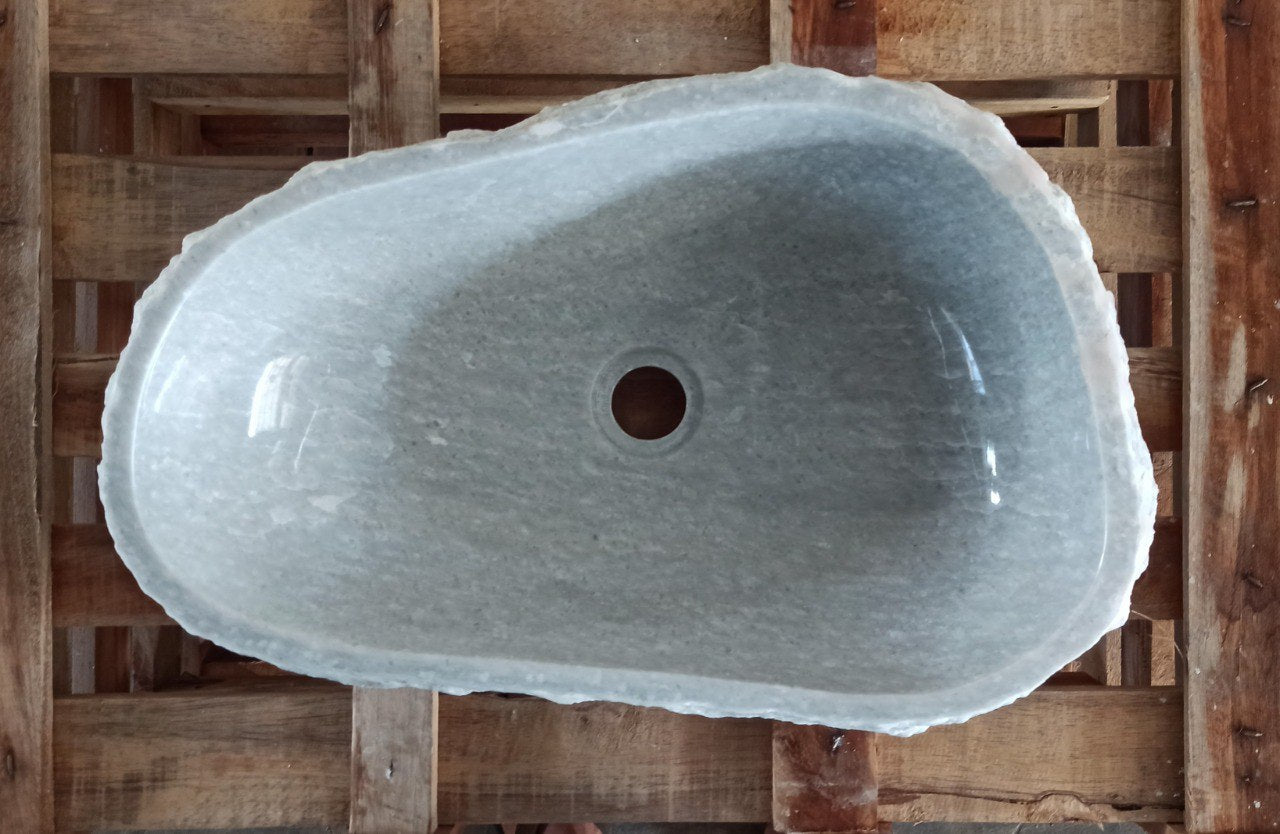 Top view of 5130-533514 light gray onyx sink with polished interior and rough natural exterior, elongated organic shape.
