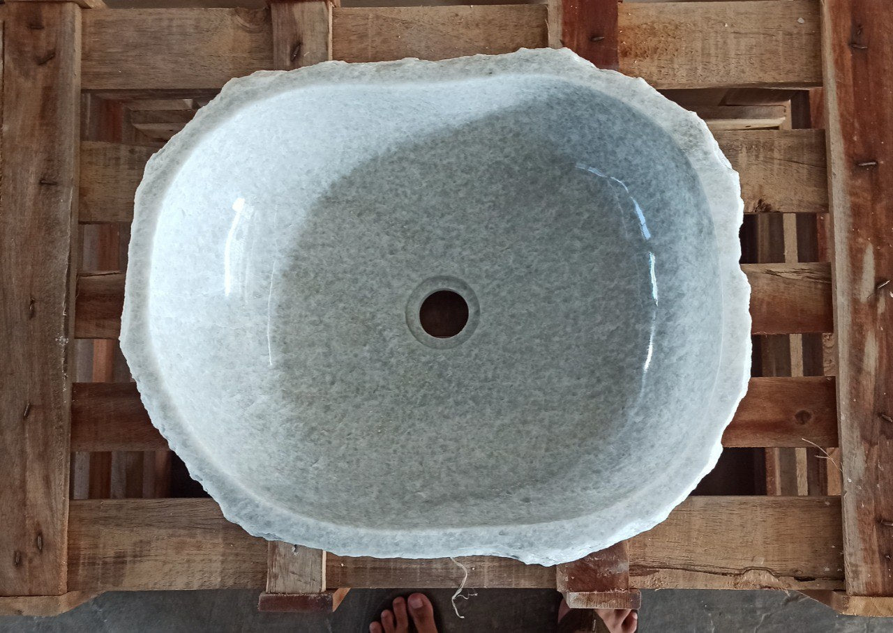 Top view of 5132-493915 light gray onyx sink with polished interior and rough natural exterior, organic oval shape.
