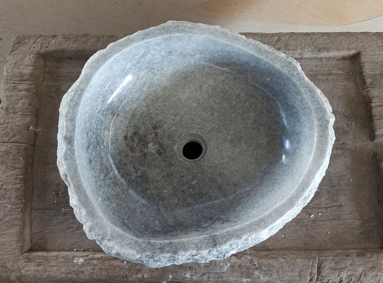 Top view of 5087-554917 gray onyx sink with polished interior and rough natural exterior, organic irregular shape.
