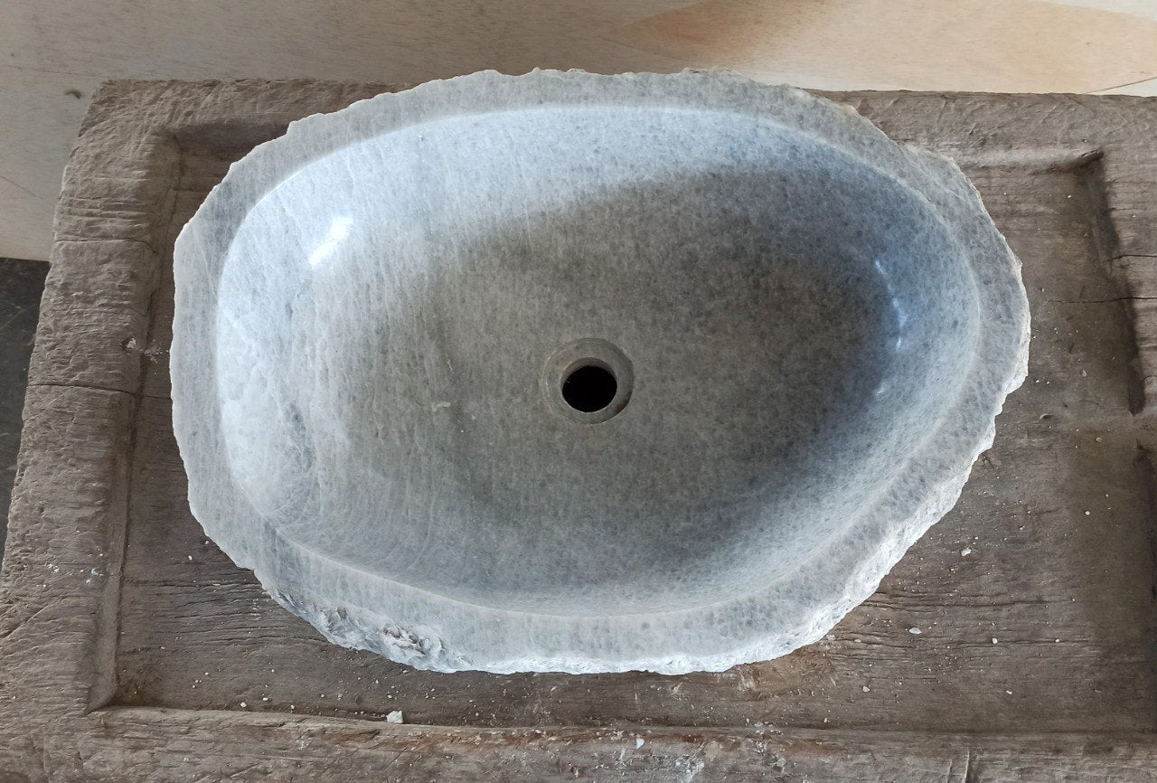 Top view of 5084-564316 light gray onyx sink with polished interior and rough natural exterior, organic irregular shape.
