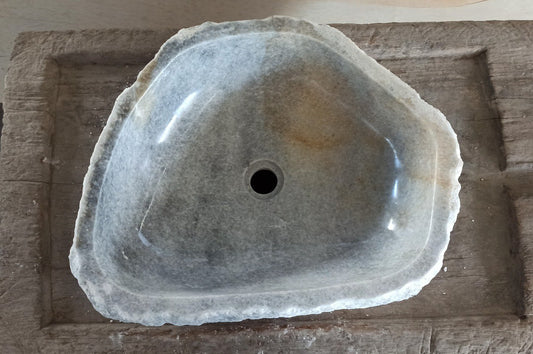 Top view of 5089-553515 gray–beige onyx sink with polished interior and rough natural exterior, triangular organic shape.
