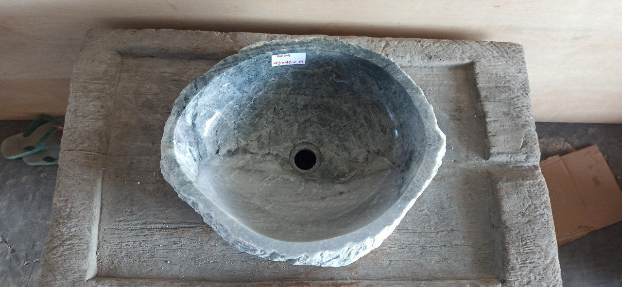 Top view of 5094-494014 dark gray onyx sink with polished interior and rough natural exterior, organic irregular shape.
