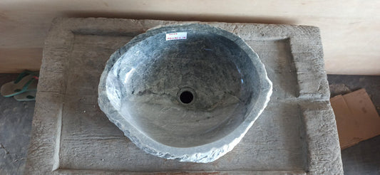 Top view of 5094-494014 dark gray onyx sink with polished interior and rough natural exterior, organic irregular shape.
