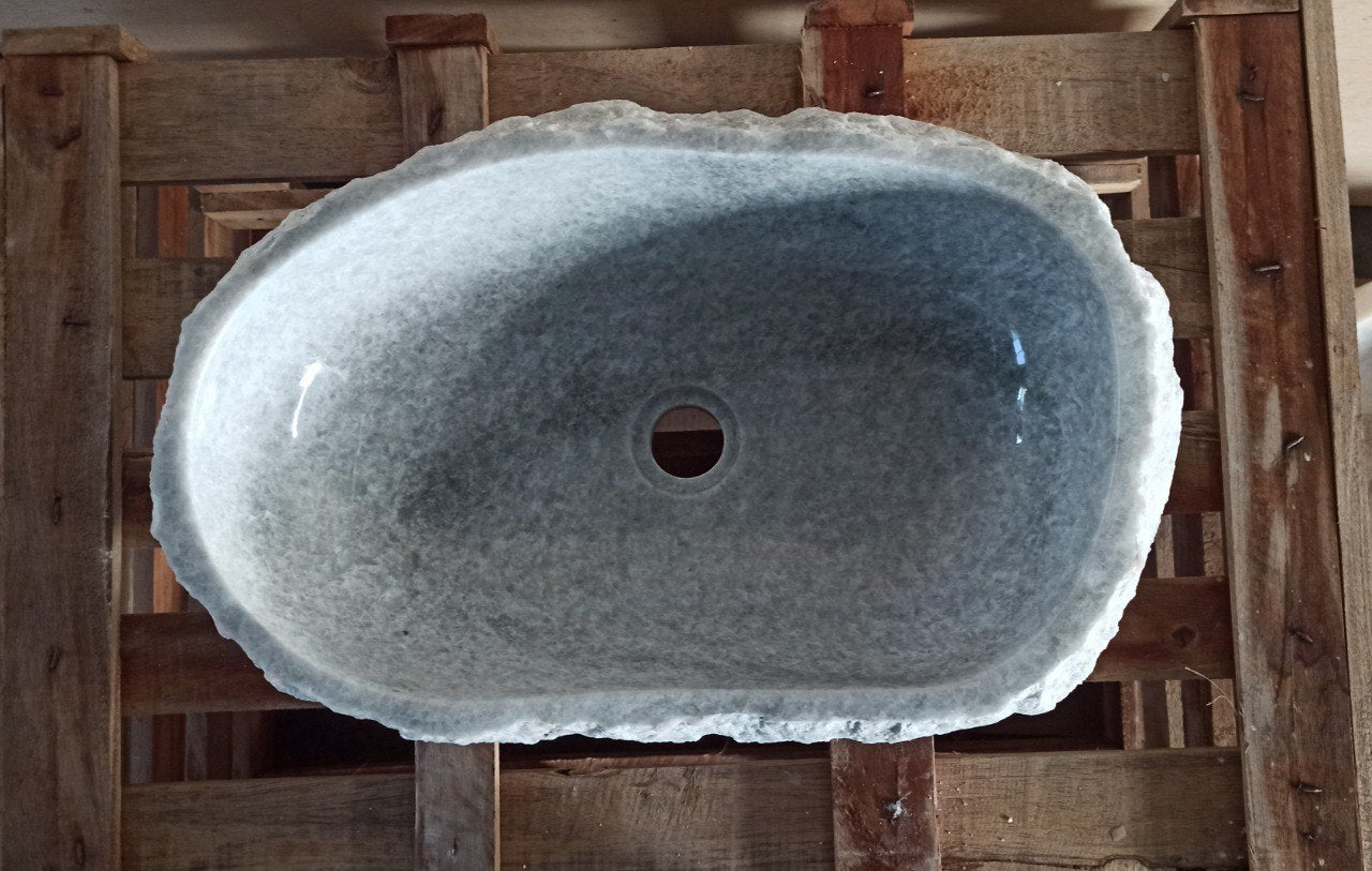 Top view of 5136-553515 light gray onyx sink with polished interior and rough natural exterior, elongated organic oval shape.
