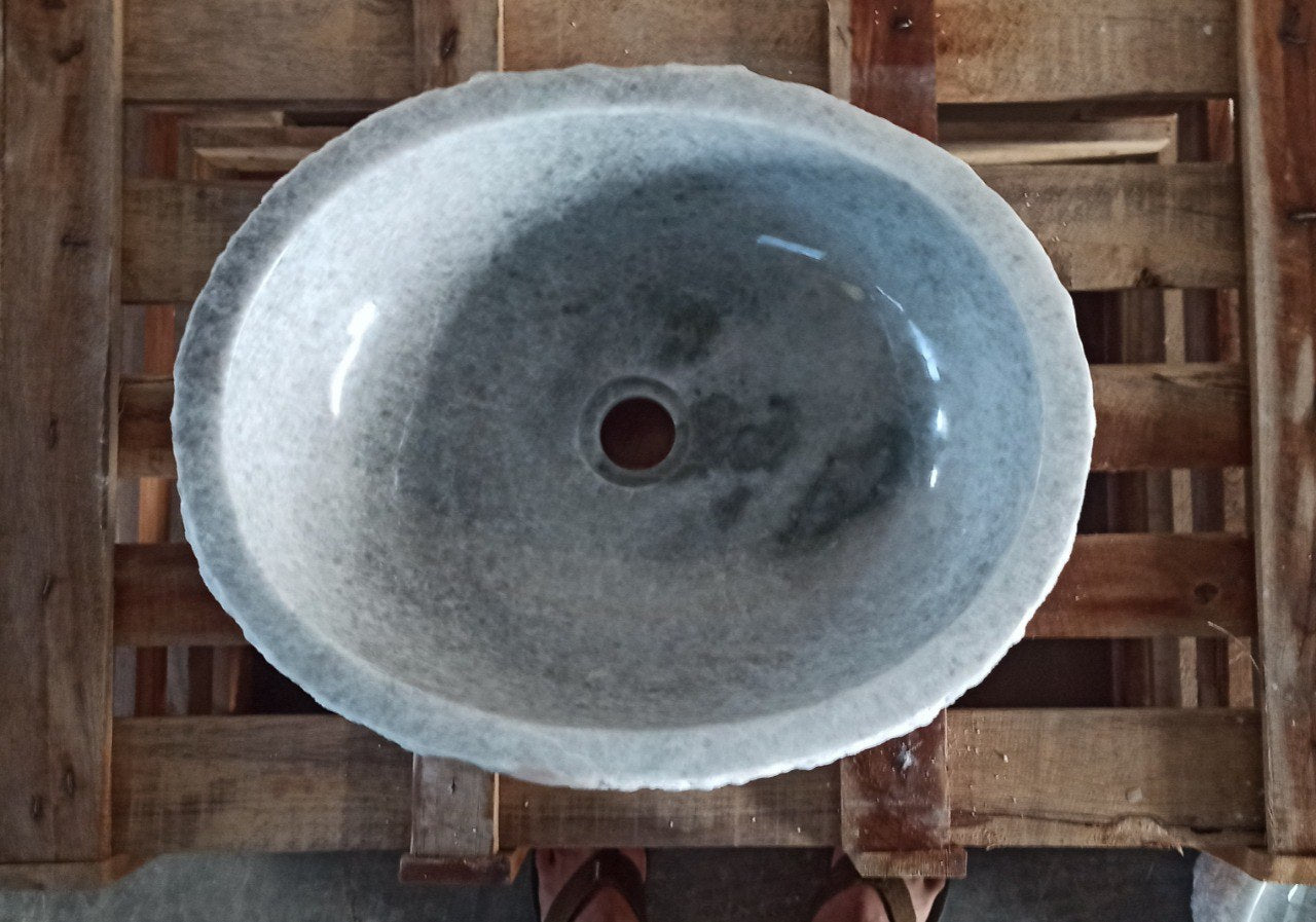 Top view of 5139-463715 gray onyx sink with polished interior and rough natural exterior, organic oval shape.
