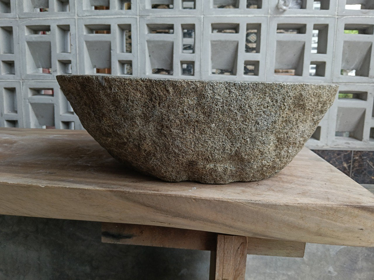 Left side of 6890-4744 river stone vessel sink, light gray natural exterior
