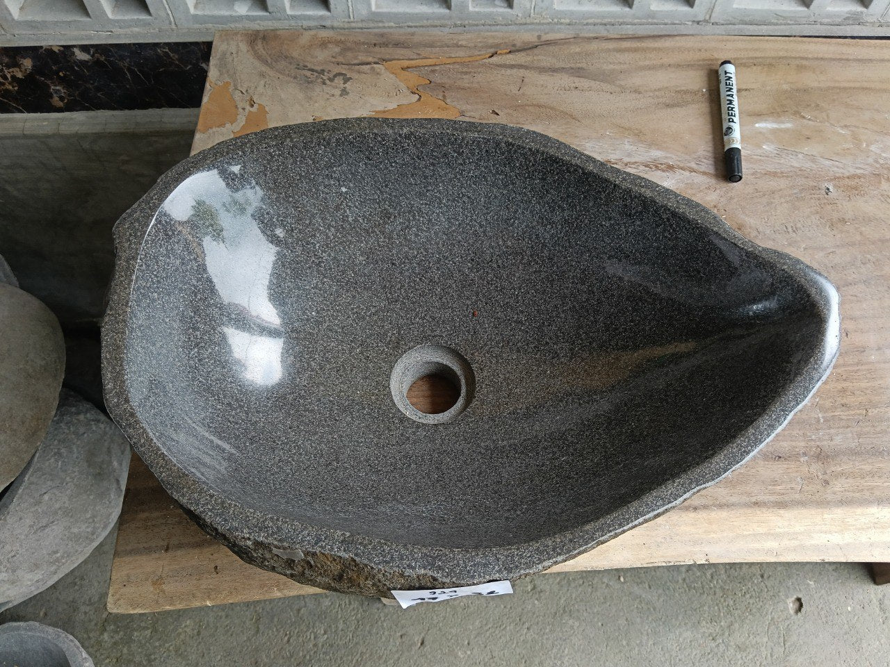 Top view of 6924-4732 dark graphite river stone sink, polished tear-drop interior
