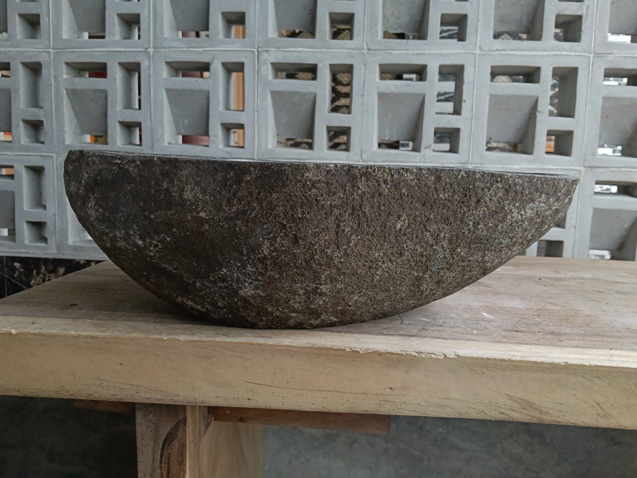 Back view of 6924-4732 handcrafted stone bathroom basin with raw exterior texture
