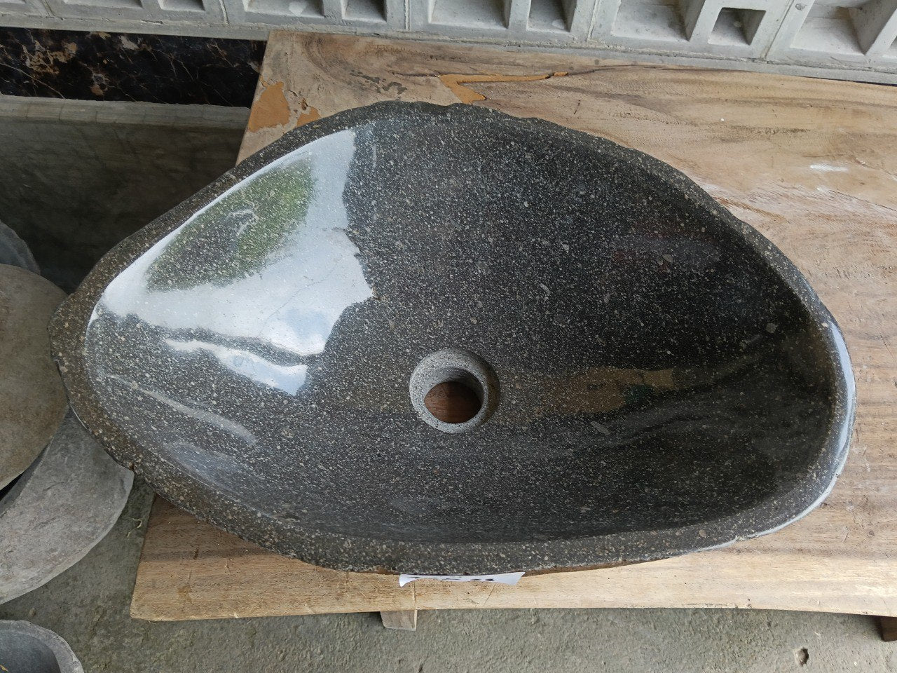 Top view of 6925-4733 dark graphite river stone sink, polished tear-drop interior

