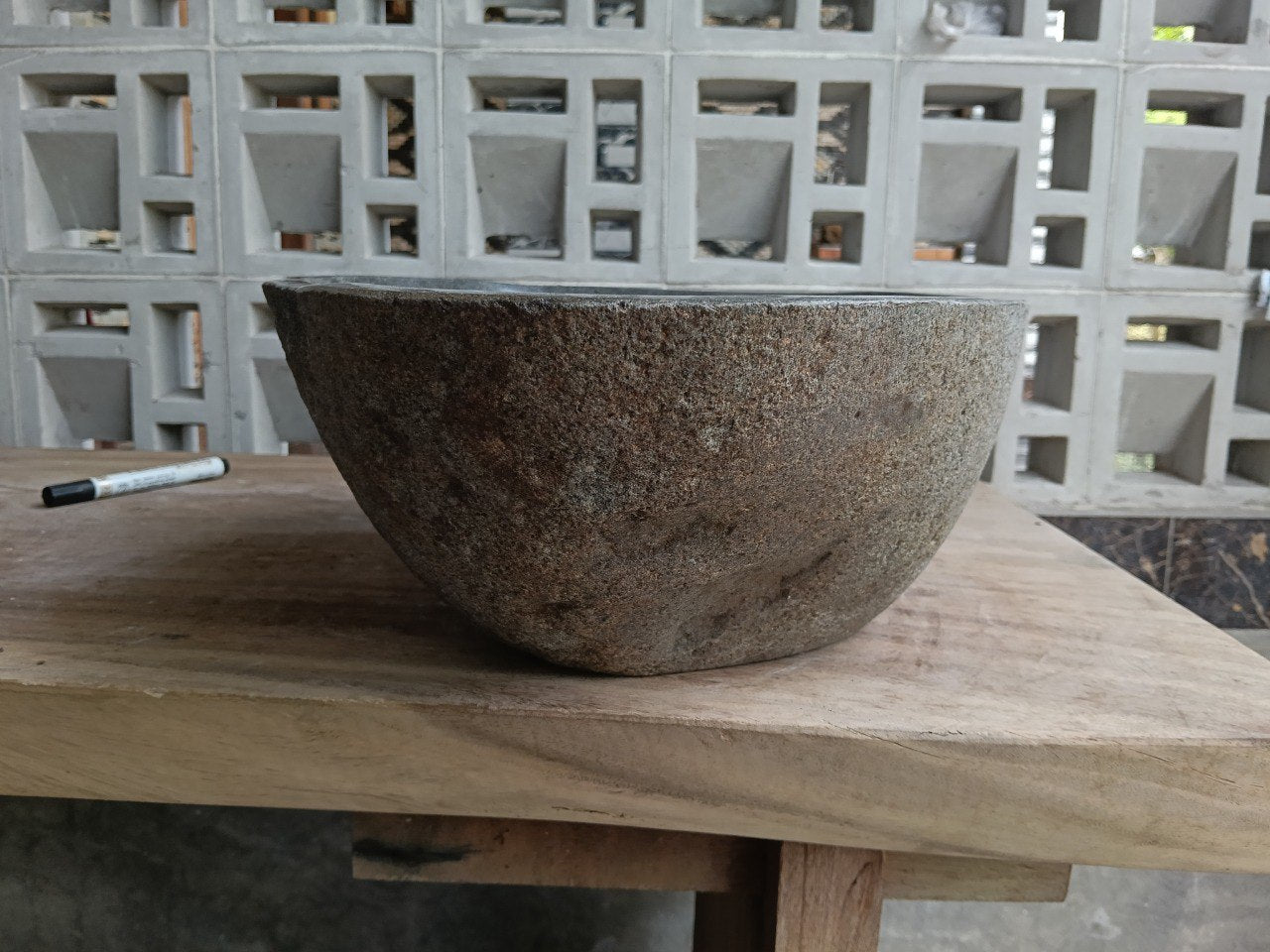 Right side of 6927-4533 organic stone vessel sink, handcrafted from a single boulder
