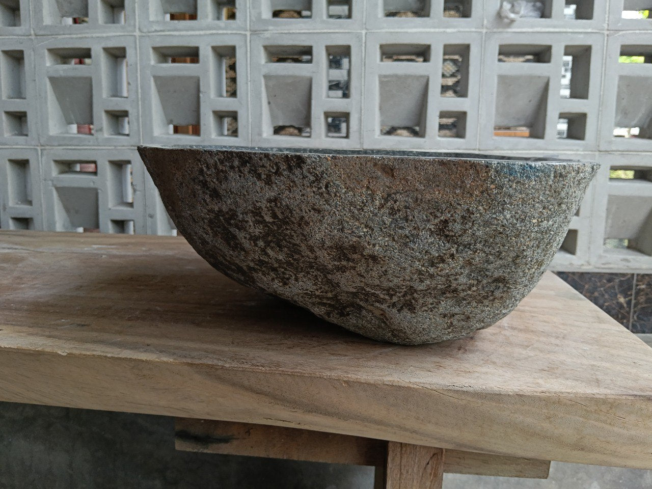Right side of 6929-4538 organic stone vessel sink, carved from a single boulder

