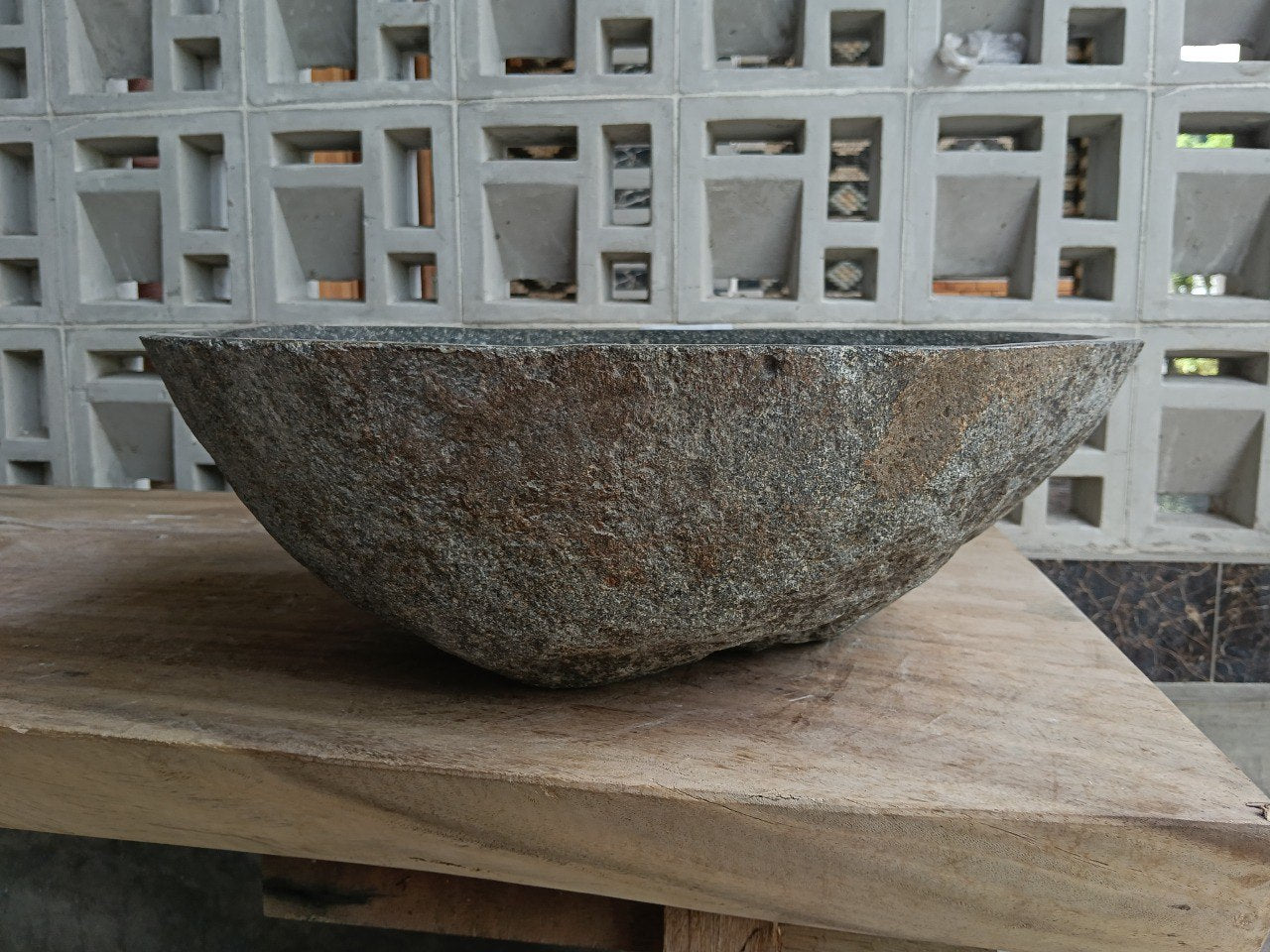 Back view of 6929-4538 handcrafted stone bathroom basin with raw textured exterior
