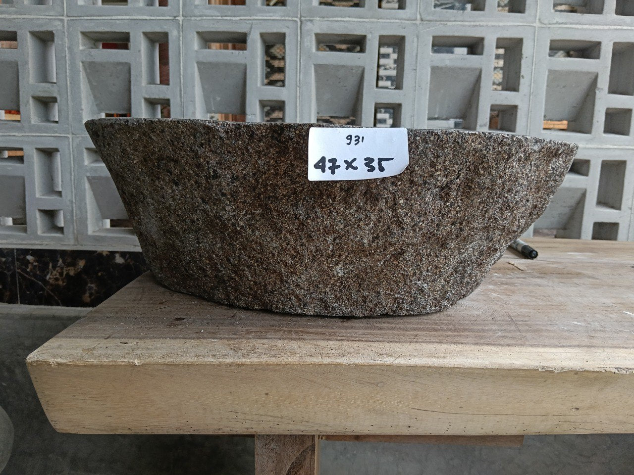 Front view of 6931-4735 natural river rock vessel sink, organic oval shape
