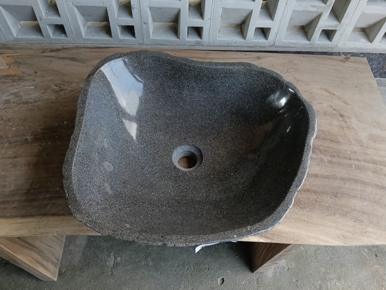 Top view of 6951-4540 graphite gray river stone sink with polished interior
