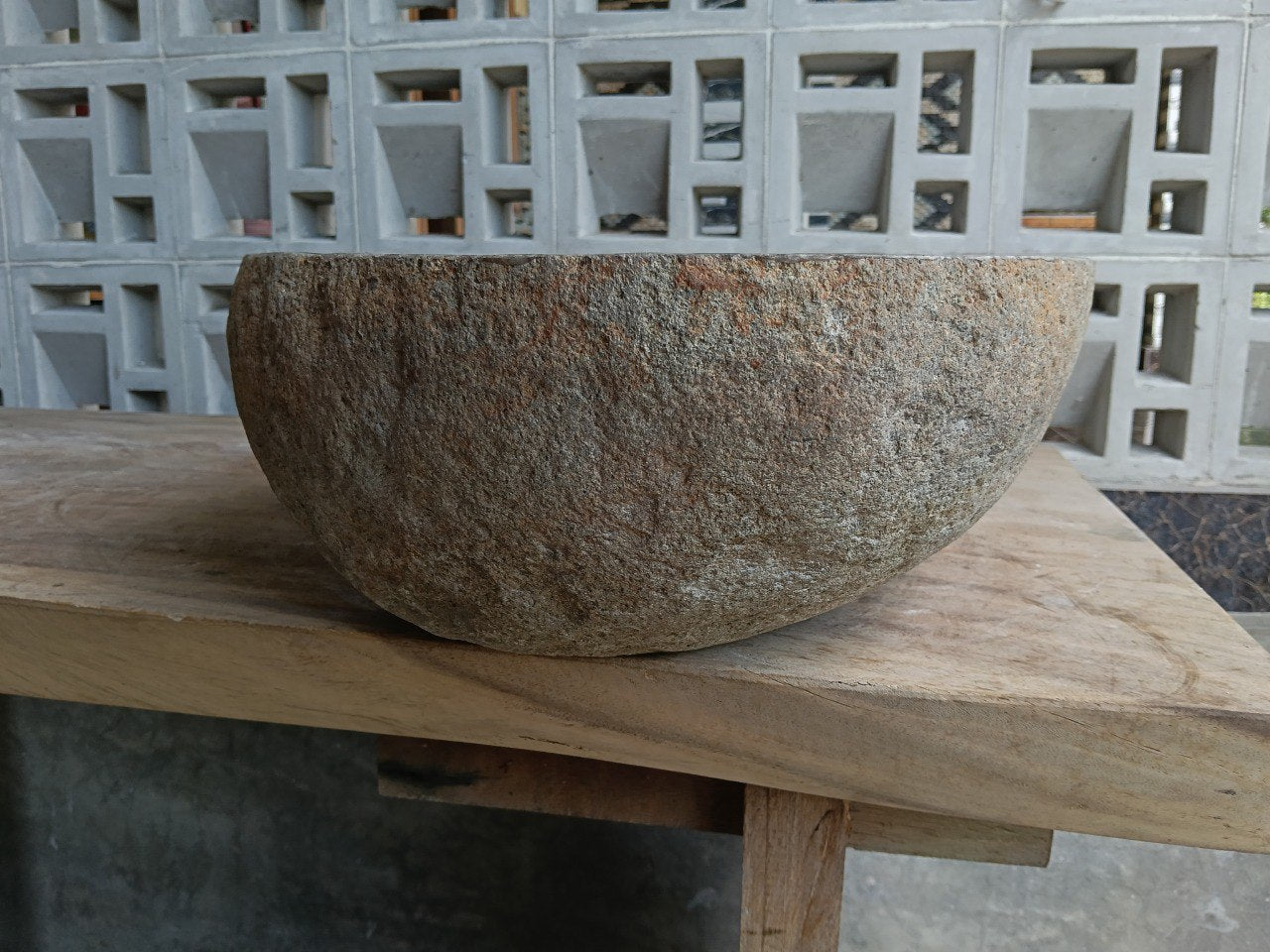 Right side of 6957-4739 stone vessel sink with polished bowl and rustic surface
