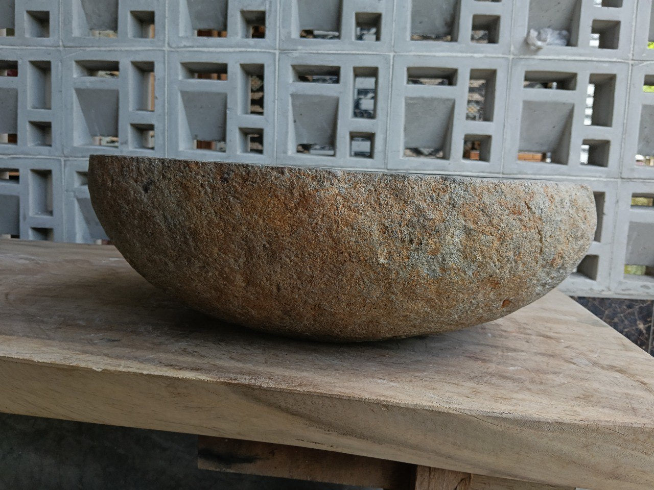 Back view of 6957-4739 handcrafted stone bathroom basin with raw exterior texture
