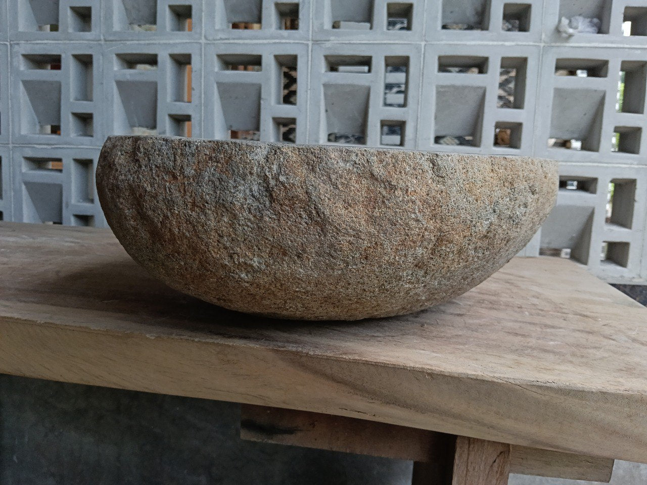 Left side of 6957-4739 river stone sink, gray-brown natural exterior
