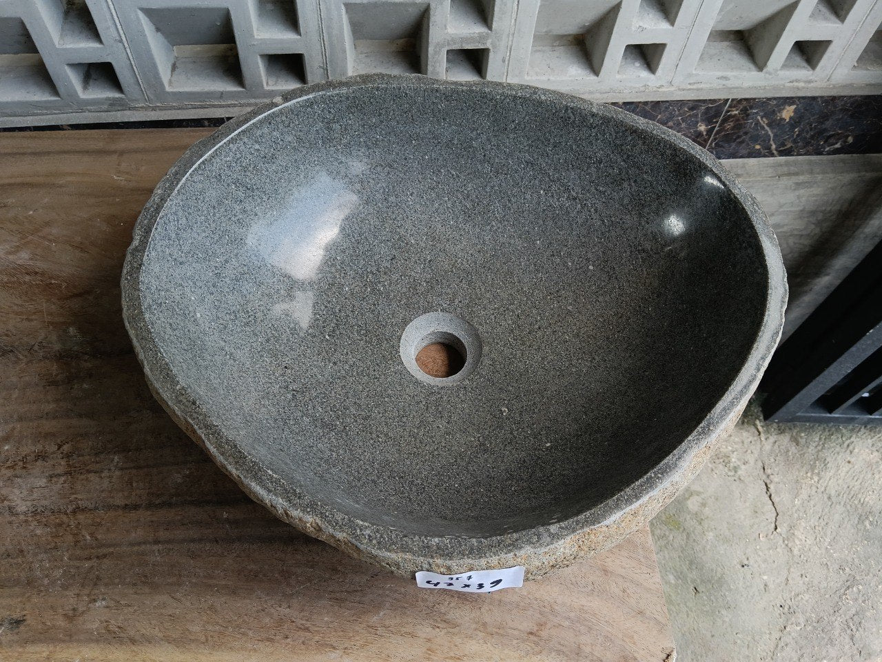 Top view of 6957-4739 dark graphite river stone sink, polished oval interior
