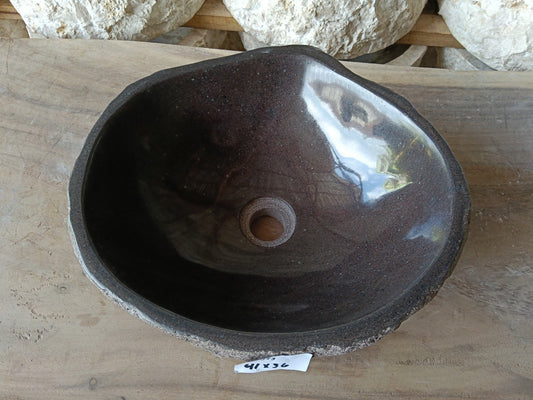 Top view of 6959-4136 dark brown river stone sink with polished interior
