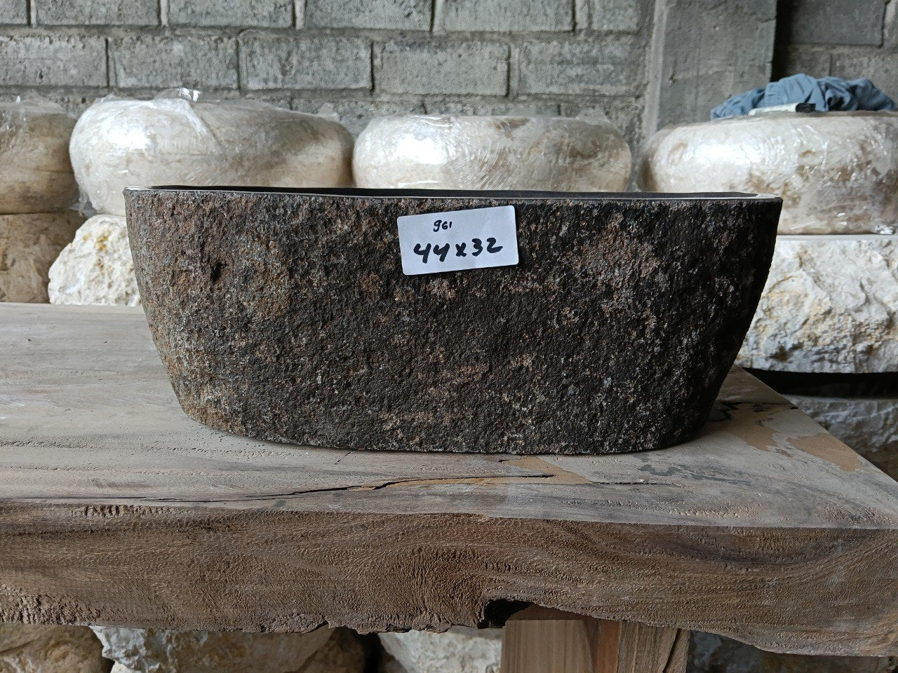 Front view of 6961-4432 handcrafted stone vessel sink, sculpted rock shape
