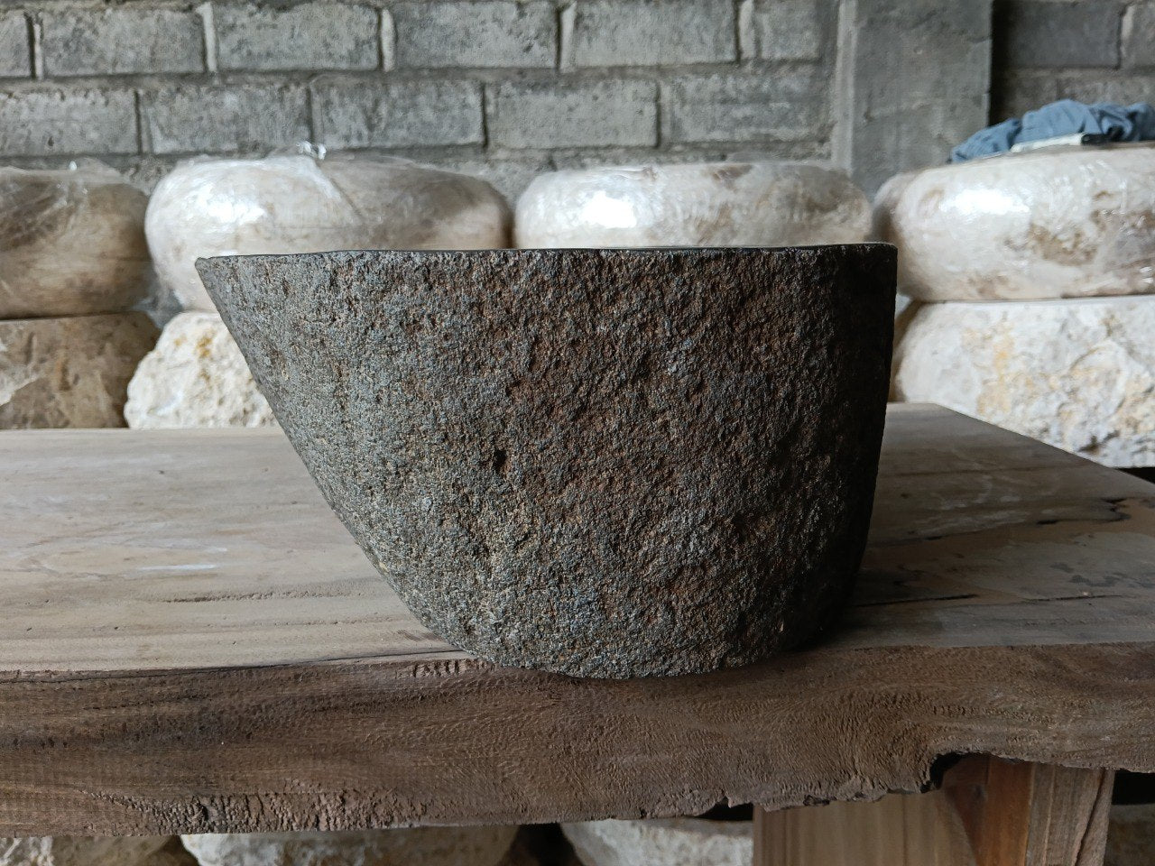 Right side of 6961-4432 premium stone sink with angular organic form
