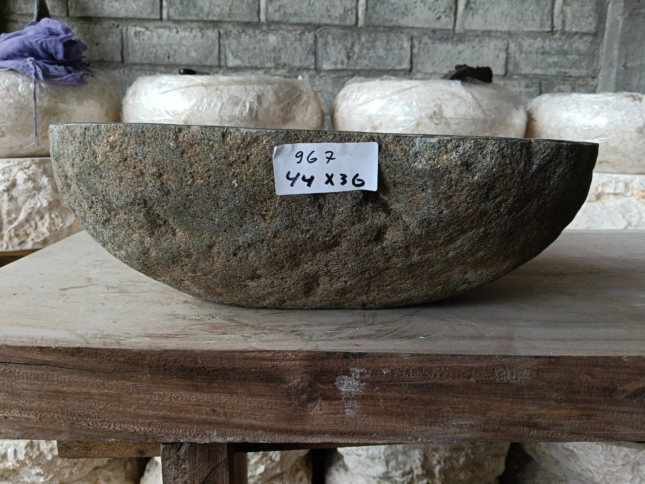 Front view of 6967-4436 natural river rock vessel sink, organic oval shape
