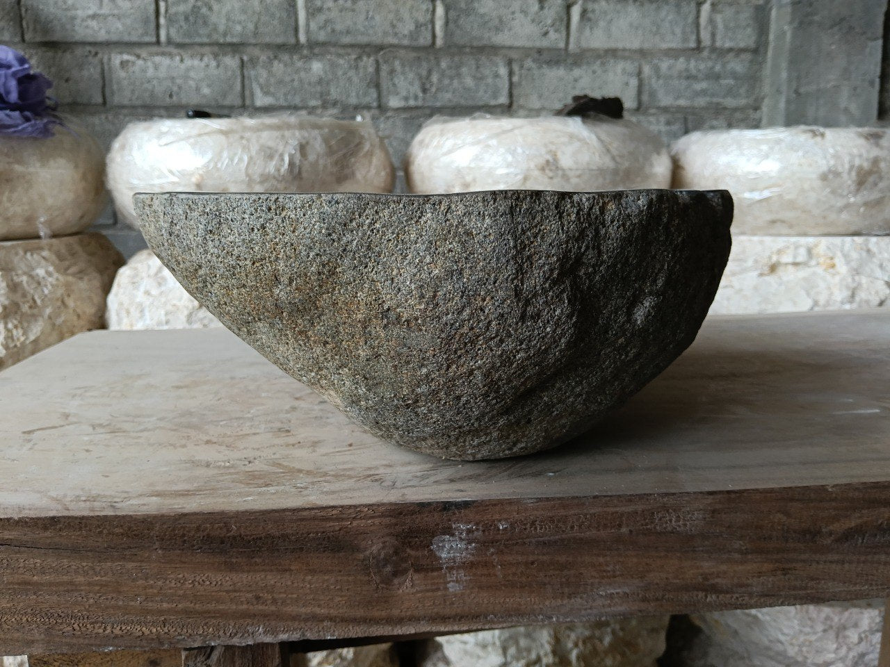 Right side of 6967-4436 oval stone vessel sink with polished dark bowl
