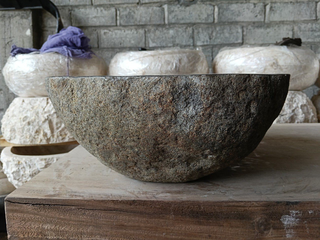 Left side of 6967-4436 river stone sink, grey-brown natural rock surface
