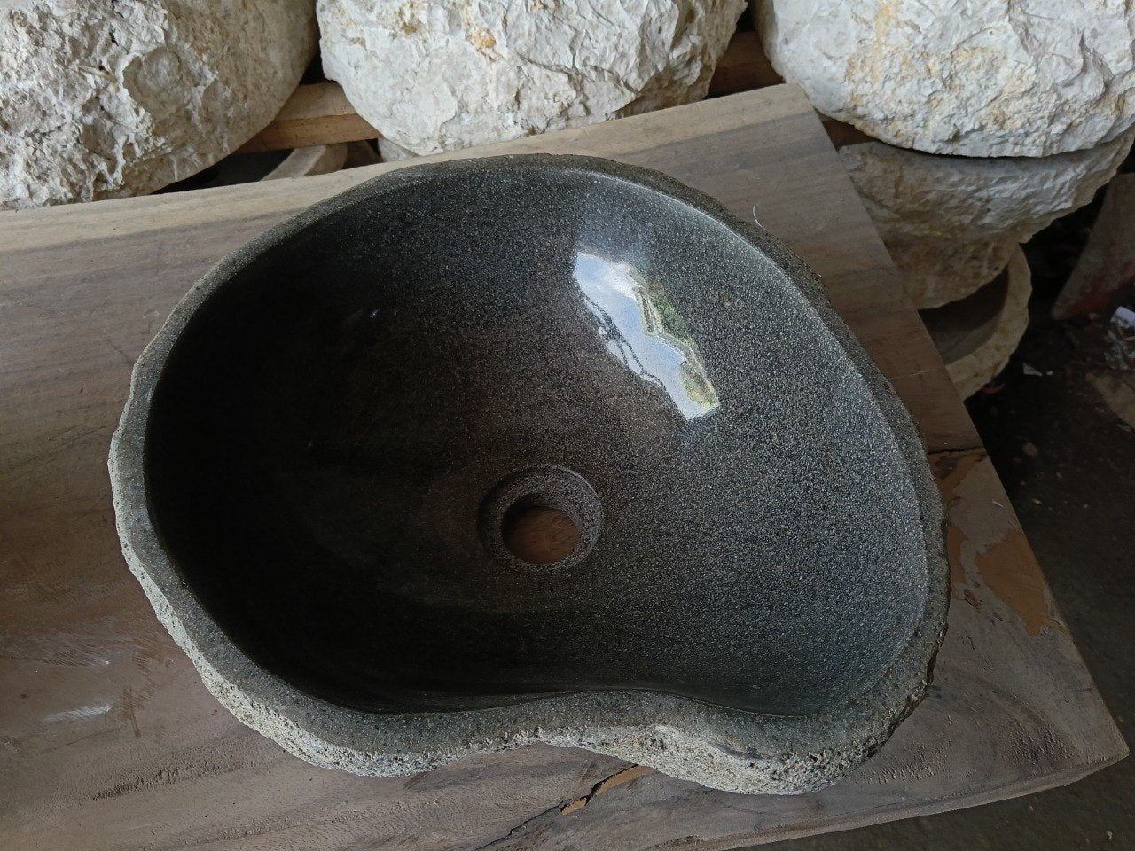 Top view of 6968-4136 graphite river stone sink with polished interior
