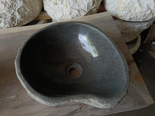 Top view of 6968-4136 graphite river stone sink with polished interior
