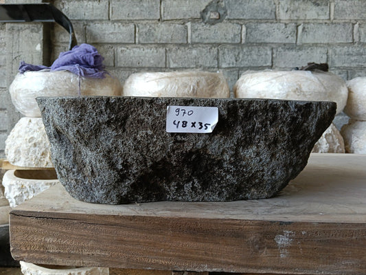 Front view of 6970-4835 natural river rock vessel sink, raw textured exterior

