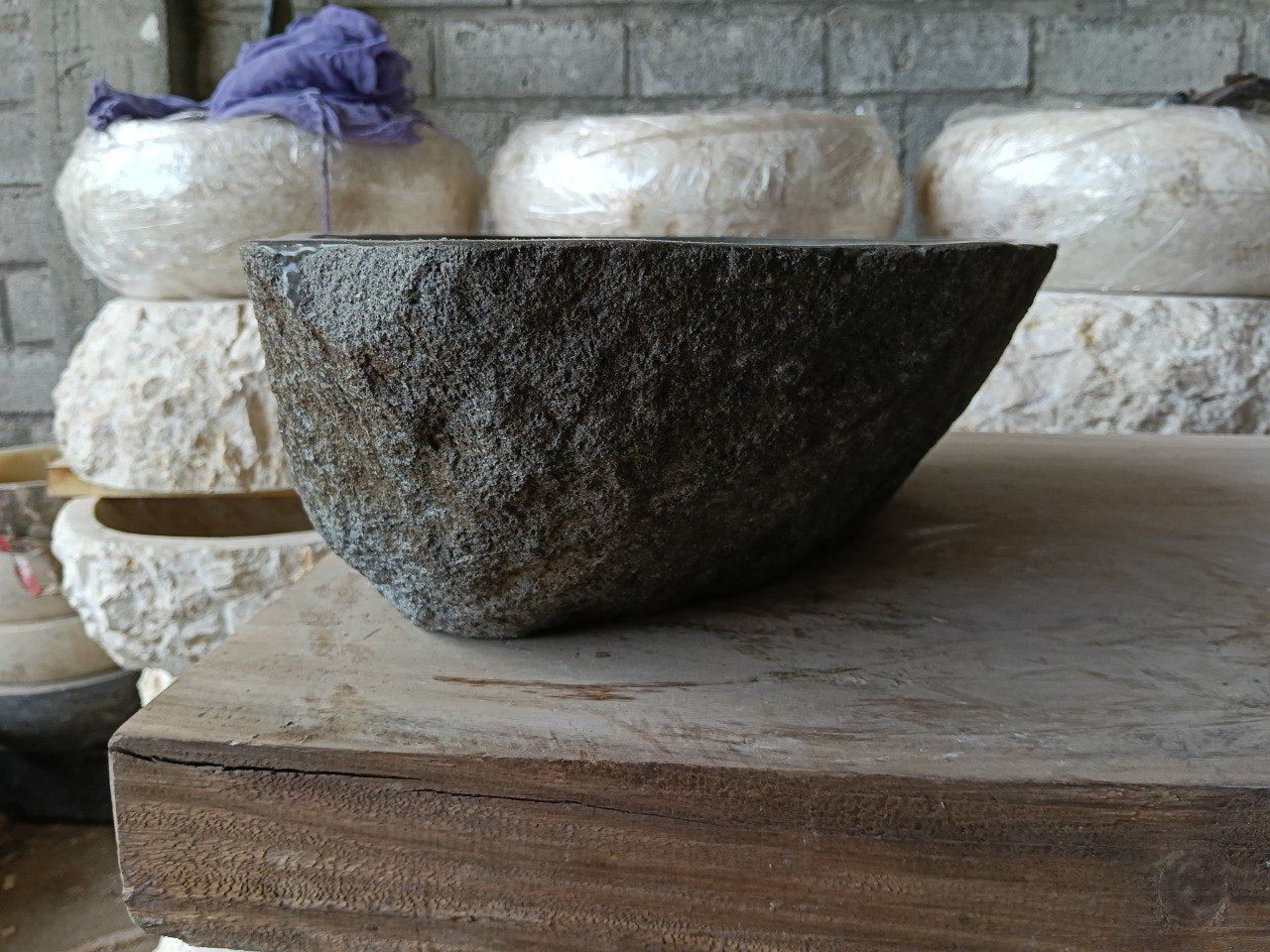 Right side of 6970-4835 natural stone sink, polished interior and rustic rock surface
