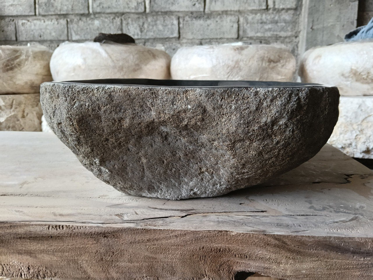 Right side of 6973-4635 natural stone sink, polished bowl and rustic outer surface
