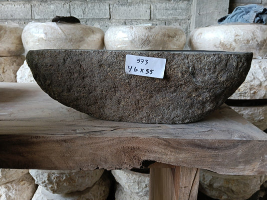 Front view of 6973-4635 natural river rock vessel sink, raw stone exterior
