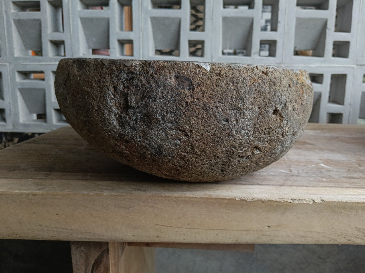 Left side of 6888-4931 river stone sink in sand-brown natural rock
