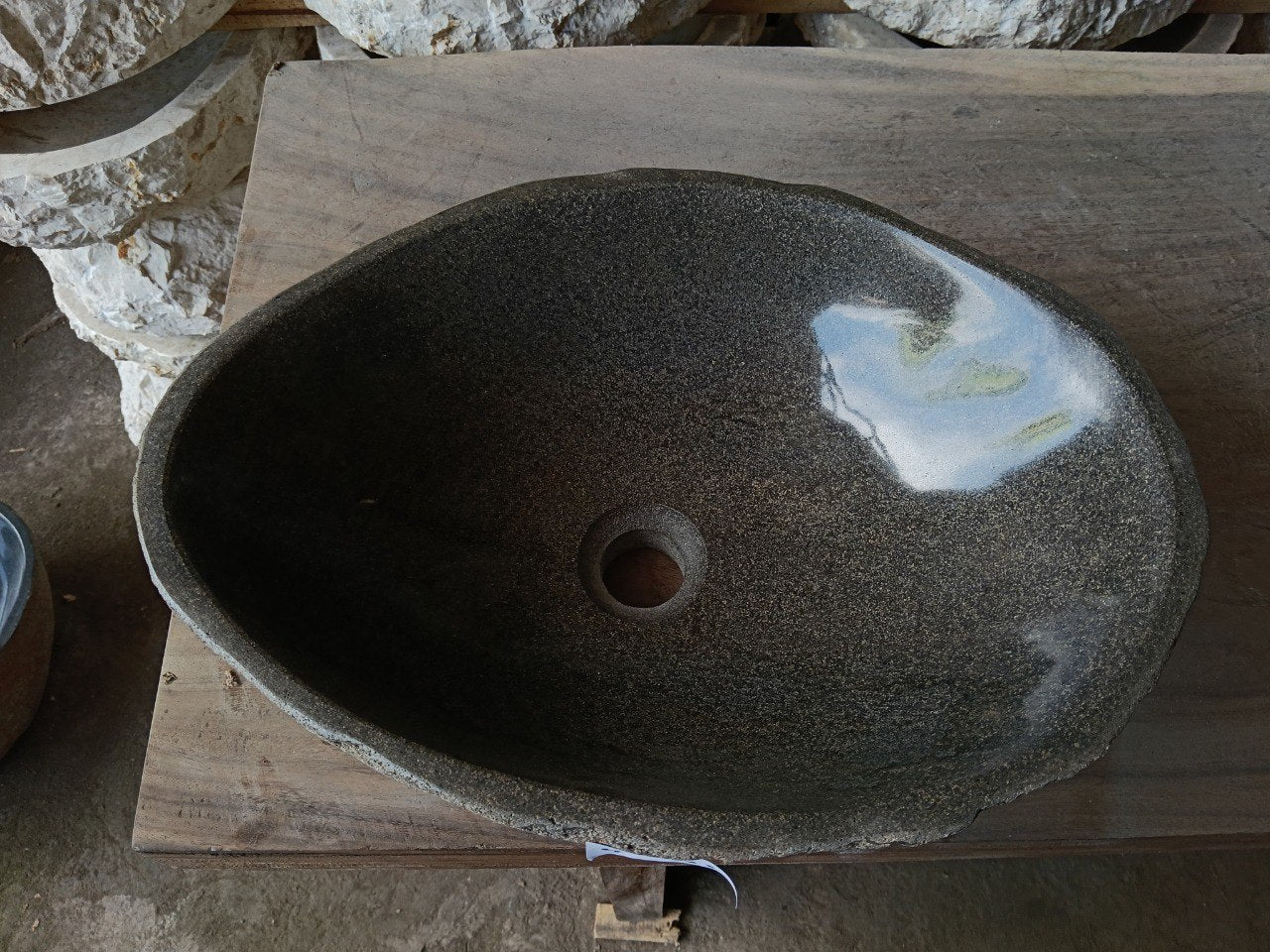 Top view of 6981-4532 river stone sink with polished graphite-olive interior
